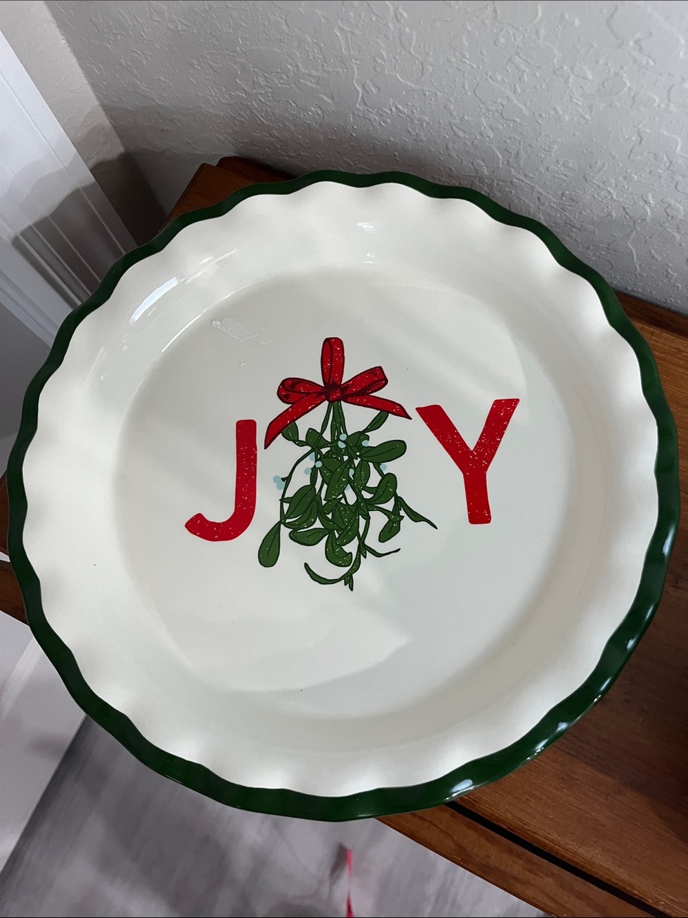 Holiday JOY Ceramic Serving Pie Plate- Cream with Green Trim and Red Accents